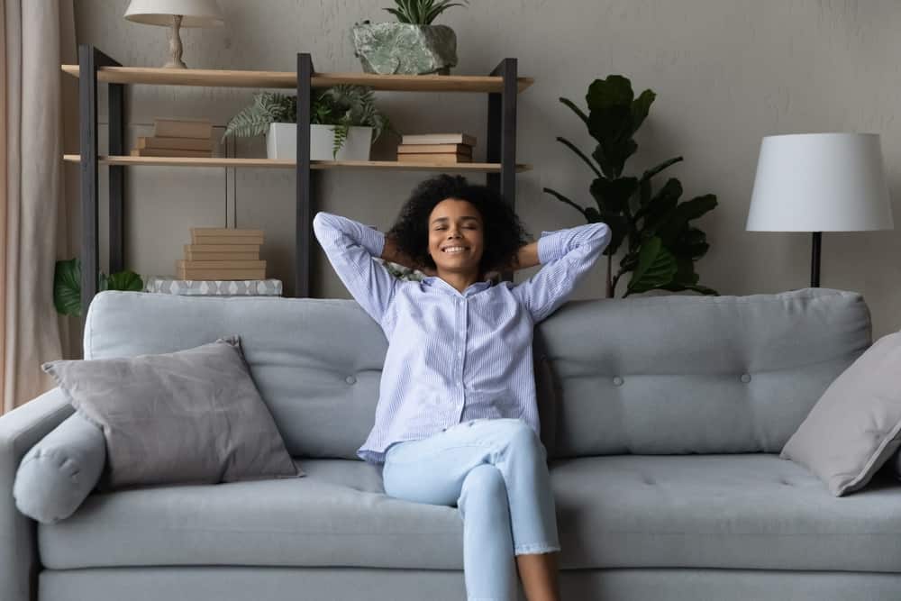 happy woman on couch