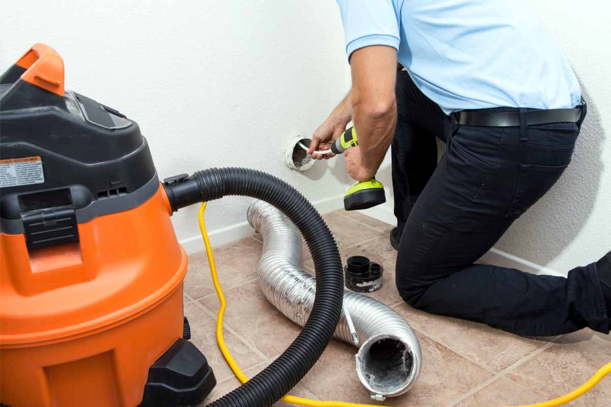Step-by-step guide for cleaning a dryer vent and removing lint buildup.
