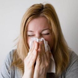 Girl Sneezing